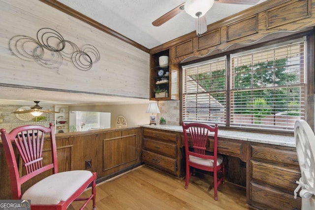 4205 Jeri Lynn Ct, Tucker, GA 30084 - office with ceiling fan, built in study area, light wood-style flooring, and crown molding