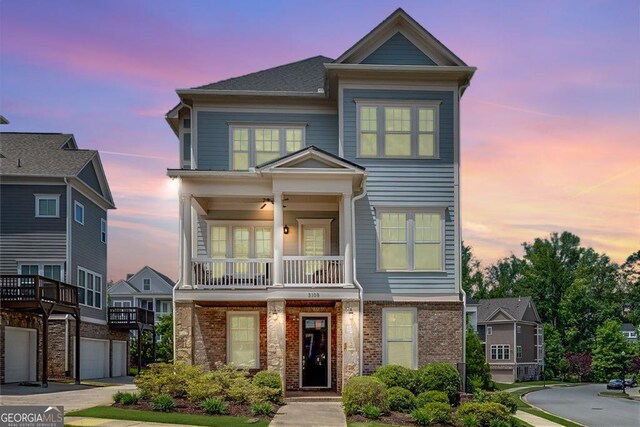 3108 Huntington Pl, Milton, GA 30004 - view of front of home with a balcony and brick siding