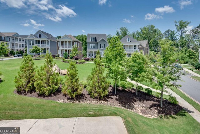 3108 Huntington Pl, Milton, GA 30004 - surrounding community featuring a lawn and a residential view