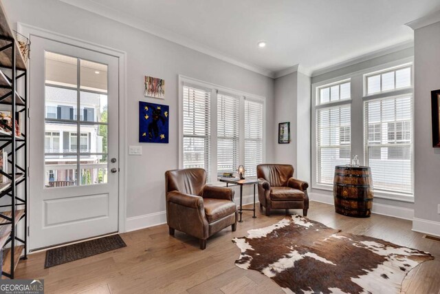 3108 Huntington Pl, Milton, GA 30004 - sitting room with crown molding, baseboards, wood finished floors, and recessed lighting