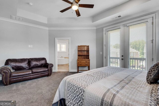 3108 Huntington Pl, Milton, GA 30004 - carpeted bedroom featuring access to exterior, a raised ceiling, connected bathroom, and baseboards