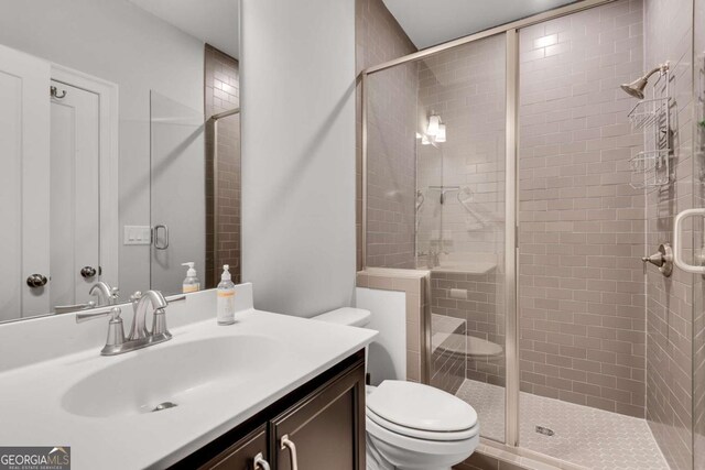 3108 Huntington Pl, Milton, GA 30004 - bathroom featuring toilet, vanity, and a stall shower