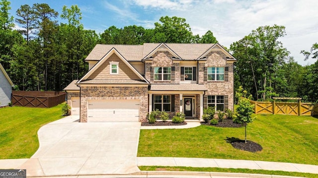 282 Brant Cir, Jefferson, GA 30549 - craftsman-style house featuring brick siding, driveway, a gate, and an attached garage
