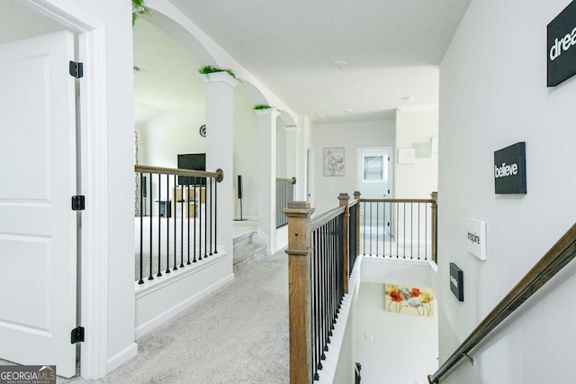 282 Brant Cir, Jefferson, GA 30549 - corridor with an upstairs landing, carpet, arched walkways, and baseboards