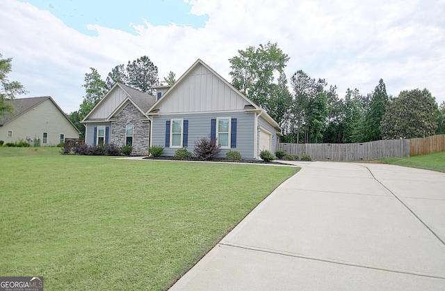 234 Thyme Leaf Way, Locust Grove, GA 30248 - view of front of home featuring board and batten siding, concrete driveway, an attached garage, and stone siding