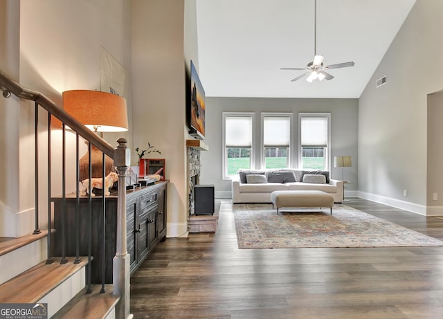 234 Thyme Leaf Way, Locust Grove, GA 30248 - living area with a ceiling fan, high vaulted ceiling, stairway, baseboards, and dark wood finished floors