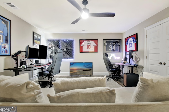 234 Thyme Leaf Way, Locust Grove, GA 30248 - home office featuring ceiling fan, baseboards, and wood finished floors
