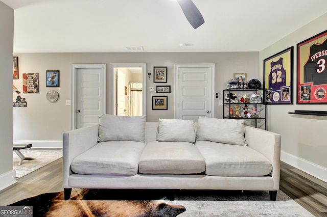 234 Thyme Leaf Way, Locust Grove, GA 30248 - living room featuring wood finished floors, baseboards, and a ceiling fan