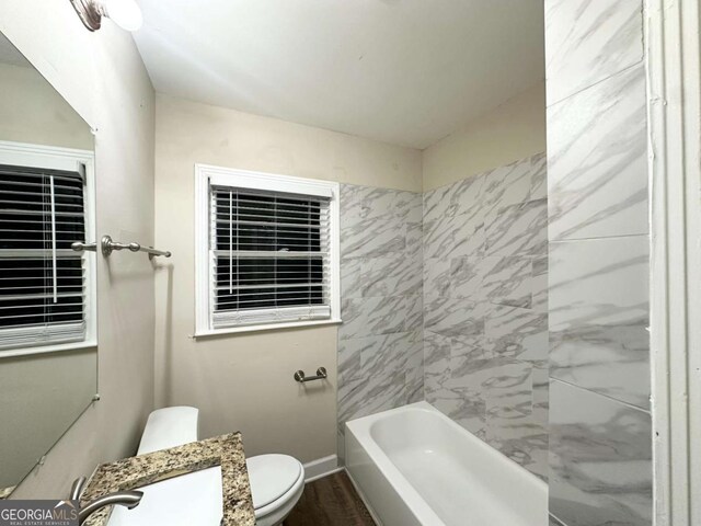 2239 Nelms Dr SW, Atlanta, GA 30315 - bathroom featuring toilet and wood finished floors