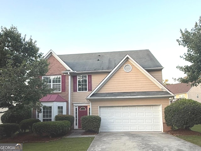 3292 Shady Valley Ct, Loganville, GA 30052 - traditional home featuring driveway, an attached garage, and brick siding