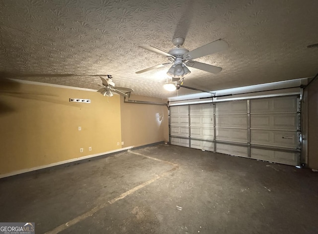 3292 Shady Valley Ct, Loganville, GA 30052 - garage with baseboards and ceiling fan