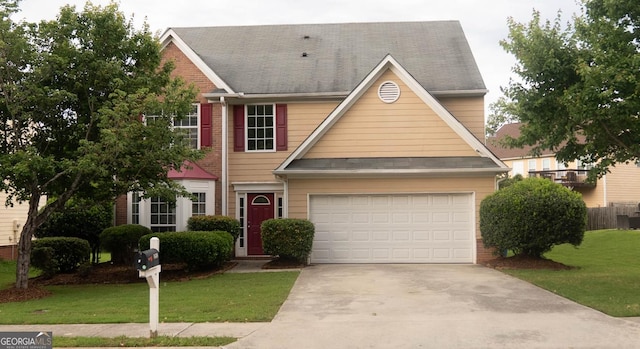 3292 Shady Valley Ct, Loganville, GA 30052 - view of front of property featuring driveway, a front yard, and a garage
