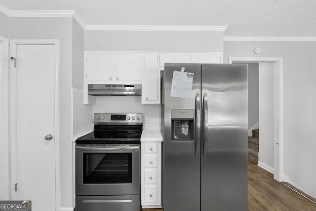 752 Roxboro Trce, Lawrenceville, GA 30044 - kitchen featuring appliances with stainless steel finishes, under cabinet range hood, white cabinets, wood finished floors, and ornamental molding