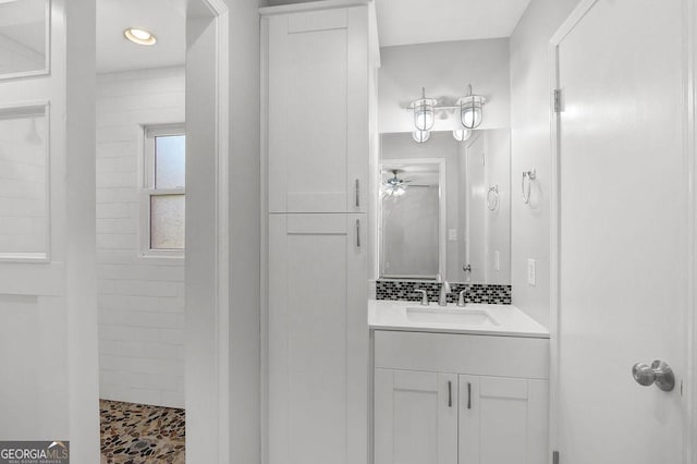 752 Roxboro Trce, Lawrenceville, GA 30044 - bathroom with vanity, ceiling fan, and a tile shower