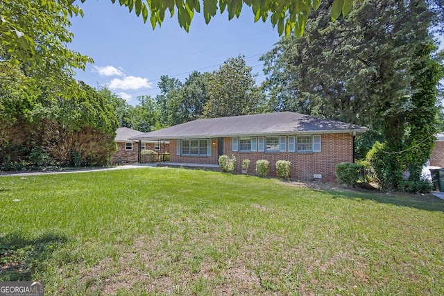 2261 Star Mist Dr SW, Atlanta, GA 30311 - ranch-style house featuring brick siding and a front yard
