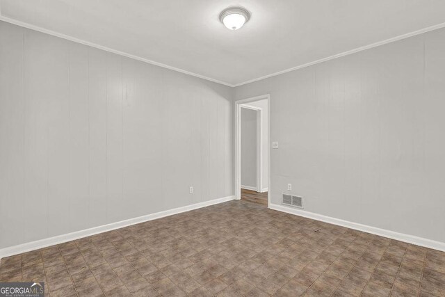 2261 Star Mist Dr SW, Atlanta, GA 30311 - unfurnished room with crown molding and baseboards
