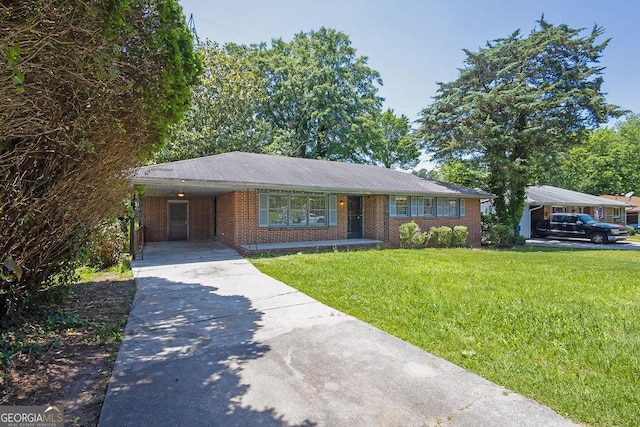 2261 Star Mist Dr SW, Atlanta, GA 30311 - single story home featuring concrete driveway, a front yard, brick siding, and a carport