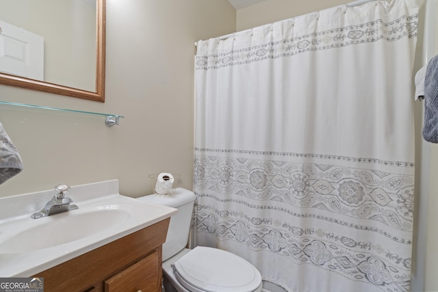 572 Austin Rd, Newnan, GA 30263 - full bathroom featuring toilet, vanity, and curtained shower