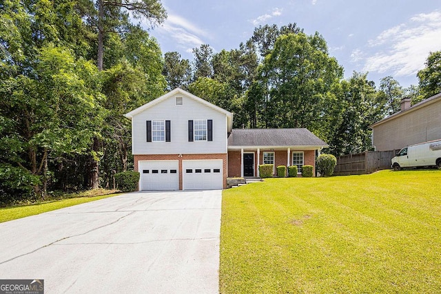 6541 Lazy Creek Ct, Lithonia, GA 30058 - split level home with concrete driveway, brick siding, an attached garage, and view of scattered trees