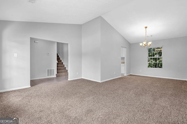 6541 Lazy Creek Ct, Lithonia, GA 30058 - unfurnished living room with carpet, stairs, baseboards, and high vaulted ceiling