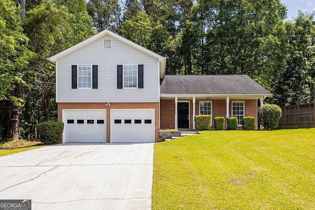 6541 Lazy Creek Ct, Lithonia, GA 30058 - tri-level home featuring brick siding, concrete driveway, an attached garage, and a porch