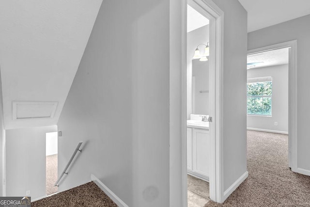 6541 Lazy Creek Ct, Lithonia, GA 30058 - staircase with carpet, baseboards, and attic access