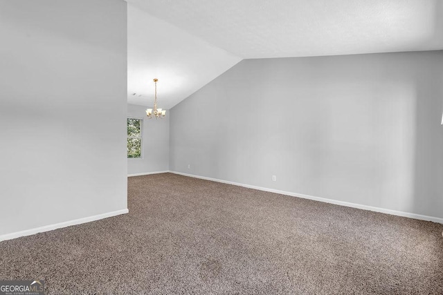 6541 Lazy Creek Ct, Lithonia, GA 30058 - bonus room with a chandelier, carpet flooring, lofted ceiling, and baseboards