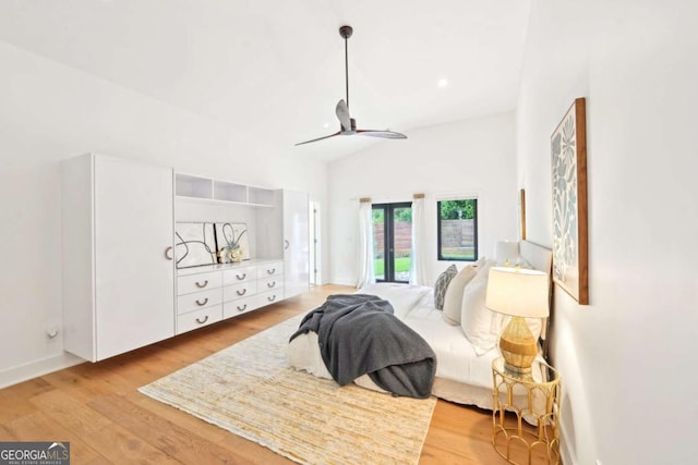 1815 Coventry Rd, Decatur, GA 30030 - bedroom featuring light wood-type flooring, access to exterior, a ceiling fan, and high vaulted ceiling