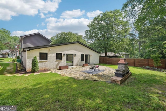 1815 Coventry Rd, Decatur, GA 30030 - rear view of house with a patio area and brick siding