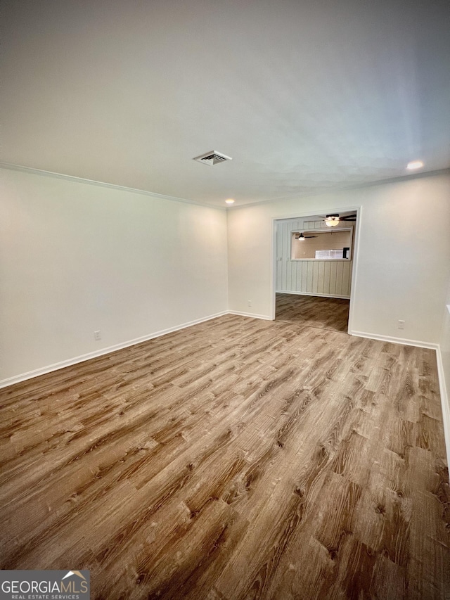 108 Plum St, Dublin, GA 31021 - spare room featuring wood finished floors and baseboards