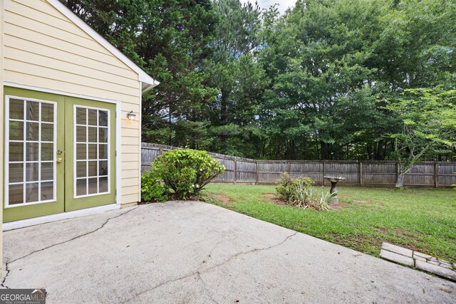 4801 Devonhurst Way, Powder Springs, GA 30127 - view of patio with french doors and view of scattered trees