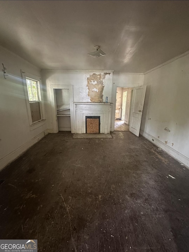 554 Nelson St, Macon, GA 31206 - unfurnished living room featuring a fireplace with flush hearth and baseboards