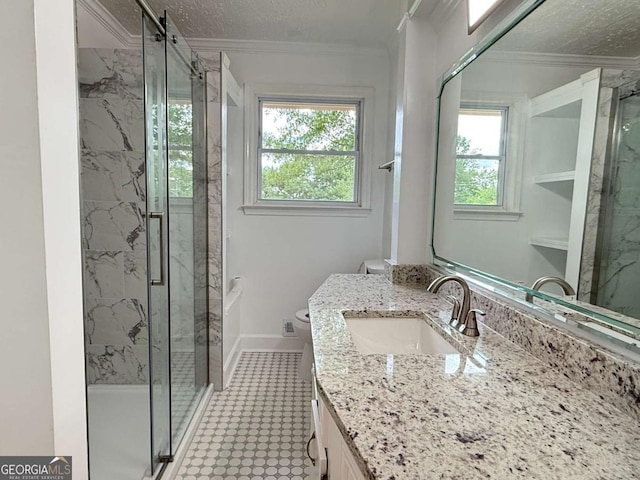 2751 Wayman Dr, Gainesville, GA 30506 - bathroom with vanity, a marble finish shower, ornamental molding, toilet, and baseboards