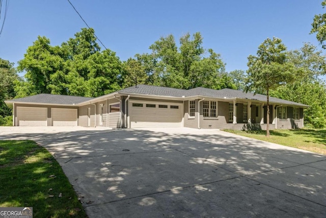 762 Rockbridge Rd NW, Lilburn, GA 30047 - single story home with driveway and a garage
