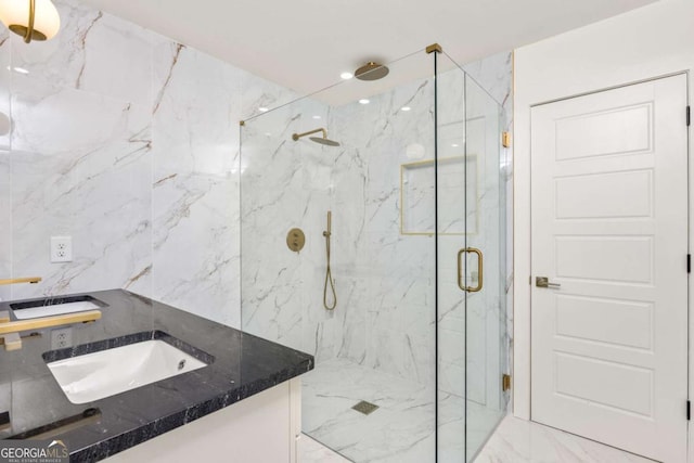 762 Rockbridge Rd NW, Lilburn, GA 30047 - bathroom featuring a marble finish shower, vanity, and marble finish flooring