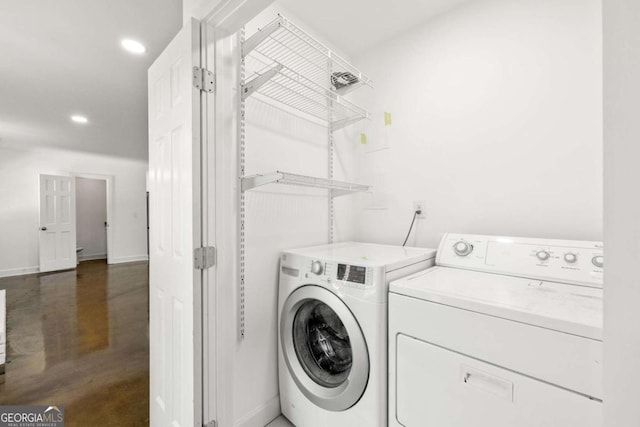 762 Rockbridge Rd NW, Lilburn, GA 30047 - laundry area with washing machine and clothes dryer, recessed lighting, and baseboards
