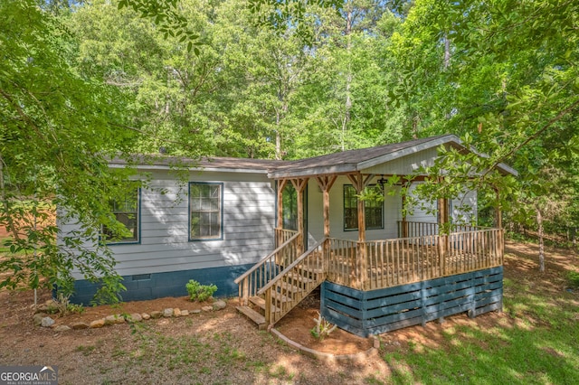 236 Overland Trl, Sparta, GA 31087 - view of front of home with a porch and crawl space