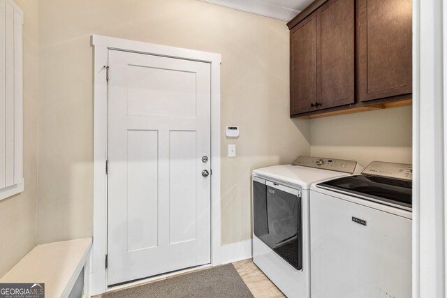 90 Middle St, Senoia, GA 30276 - laundry room featuring cabinet space and separate washer and dryer