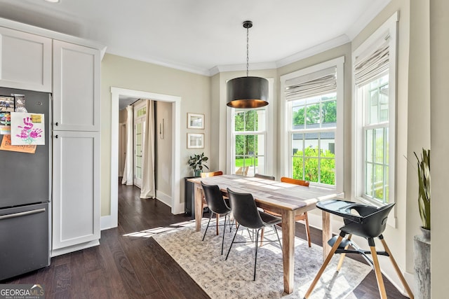 90 Middle St, Senoia, GA 30276 - dining area with baseboards, crown molding, and dark wood-style flooring