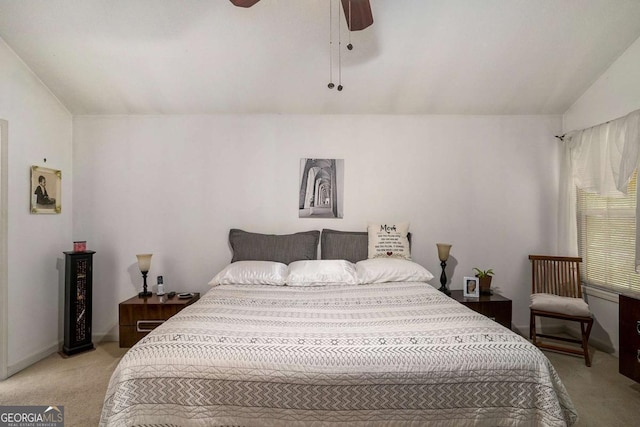 4378 Chestnut Oaks Trce, Lithonia, GA 30038 - bedroom with light carpet, lofted ceiling, and ceiling fan