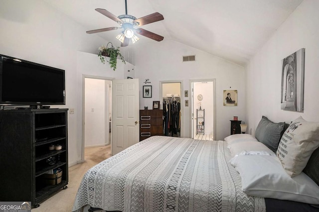4378 Chestnut Oaks Trce, Lithonia, GA 30038 - bedroom featuring light colored carpet, vaulted ceiling, a spacious closet, ceiling fan, and a closet
