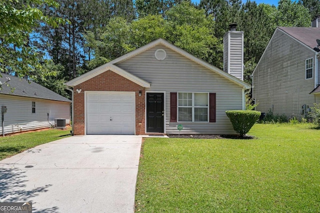4378 Chestnut Oaks Trce, Lithonia, GA 30038 - view of front of home with a front lawn, concrete driveway, a garage, and central air condition unit