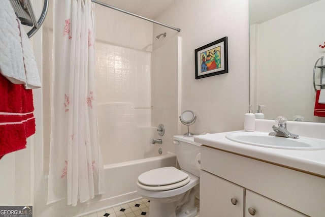4378 Chestnut Oaks Trce, Lithonia, GA 30038 - bathroom featuring shower / bath combo with shower curtain, vanity, and toilet