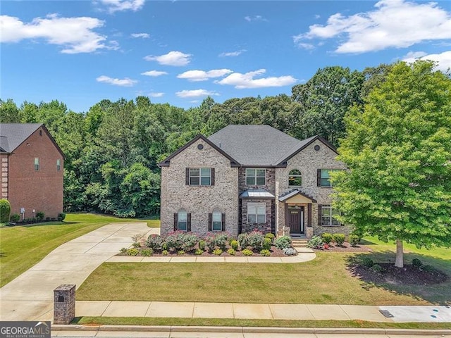 271 Learwood, Atlanta, GA 30349 - view of front of property with a front lawn and brick siding
