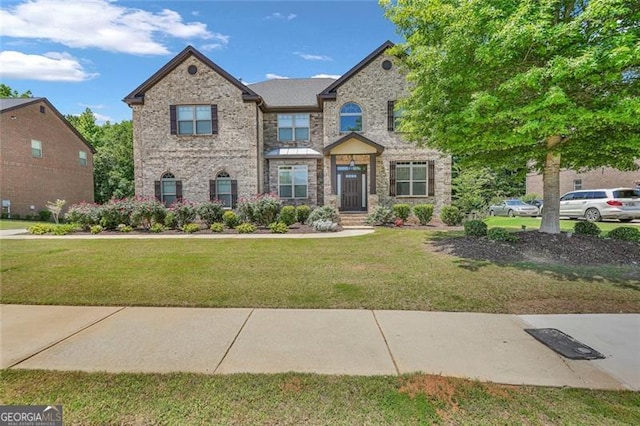 271 Learwood, Atlanta, GA 30349 - craftsman inspired home featuring a front lawn and brick siding