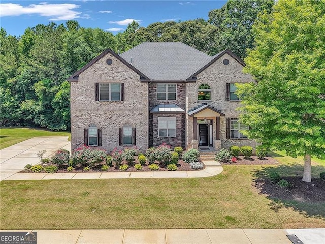 271 Learwood, Atlanta, GA 30349 - view of front of property with a front yard and brick siding