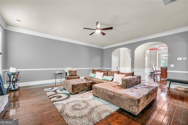 271 Learwood, Atlanta, GA 30349 - living room featuring arched walkways, a ceiling fan, dark wood-style floors, crown molding, and baseboards