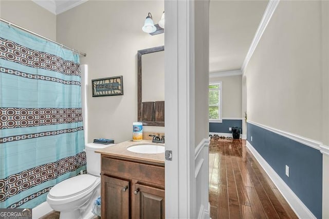 271 Learwood, Atlanta, GA 30349 - bathroom featuring crown molding, toilet, vanity, wood-type flooring, and curtained shower