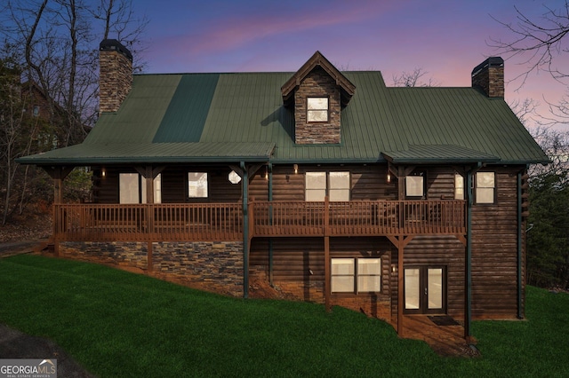 435 Ranch Mountan Dr, Dahlonega, GA 30533 - view of front facade with a chimney, french doors, a lawn, and metal roof