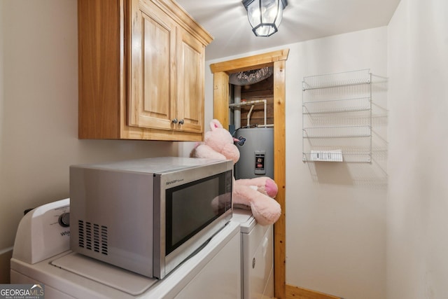 435 Ranch Mountan Dr, Dahlonega, GA 30533 - laundry area with washer and dryer, cabinet space, and electric water heater
